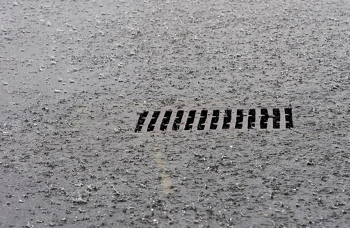 Storm drain in rain